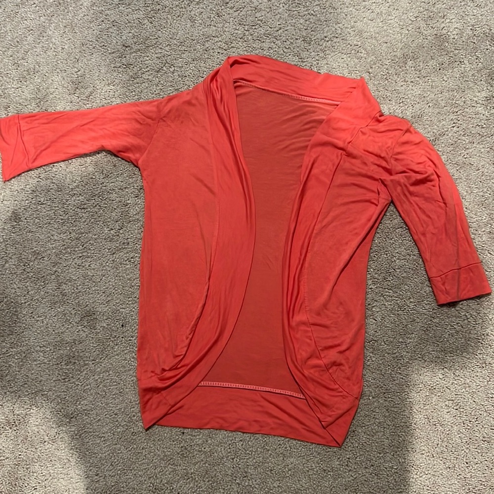 Orange shrug